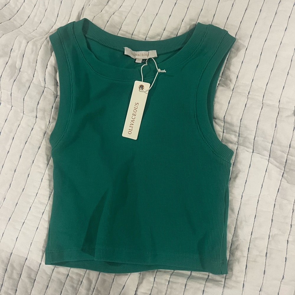 green sleeveless cropped top